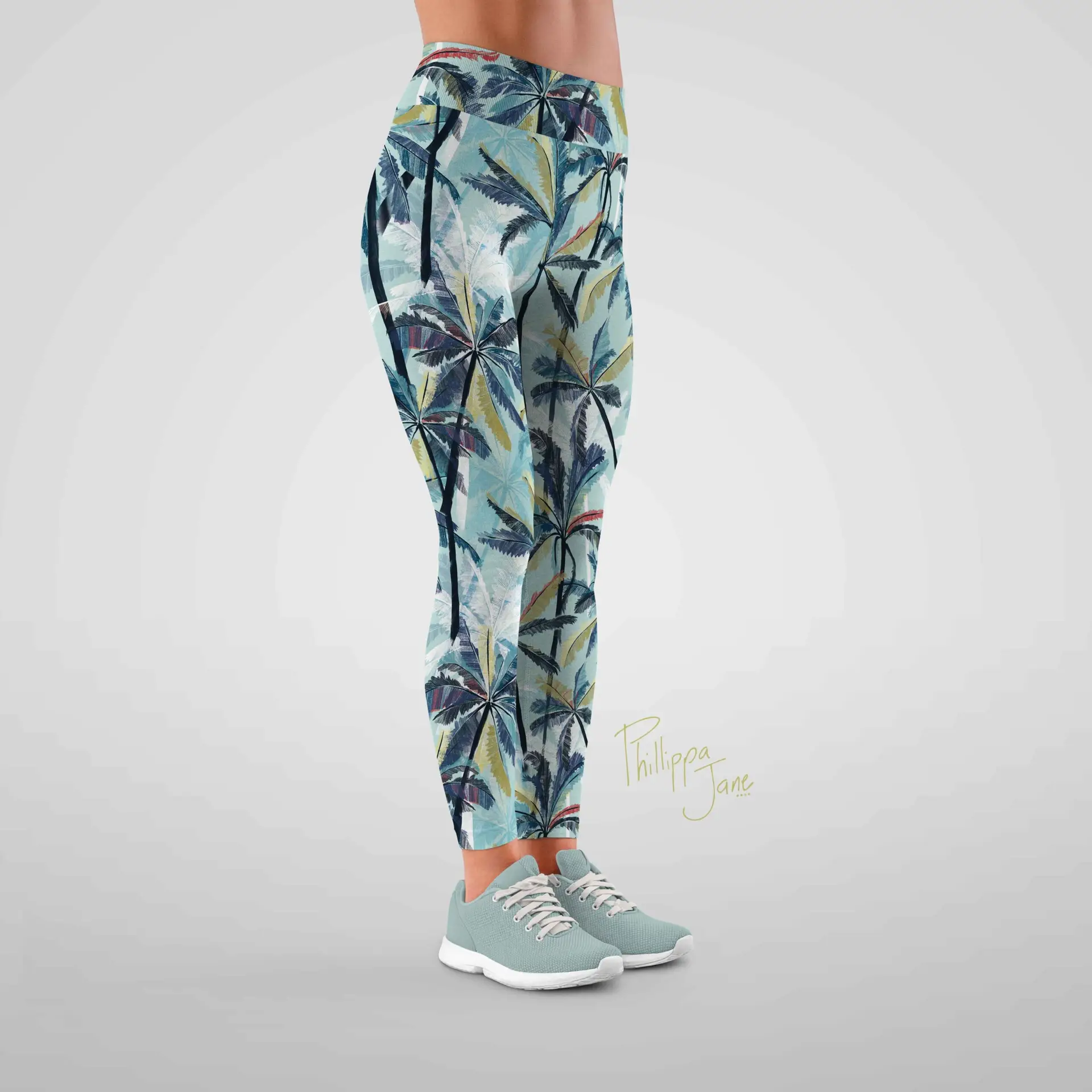A mockup of activewear tights showcasing the palm tree pattern by Phillippa Jane.