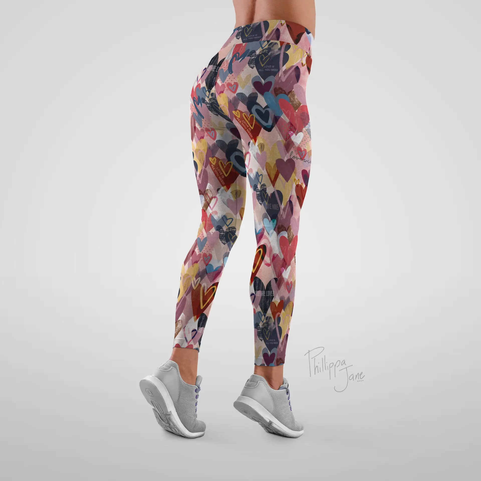 A mockup of activewear tights showcasing the bright and bold hearts pattern by Phillippa Jane
